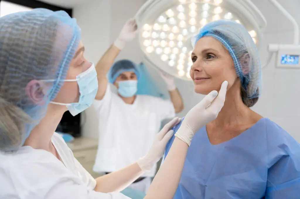 Surgeon checking patient for plastic surgery