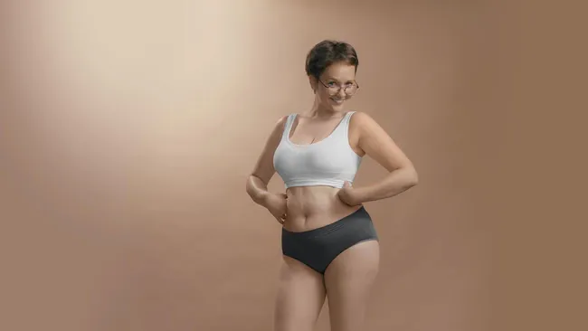 A woman happy with her new body shape