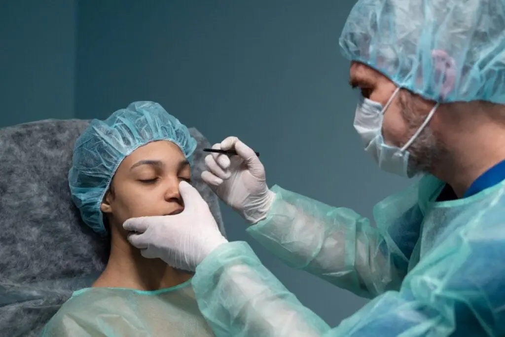 doctor checking the patient before plastic surgery
