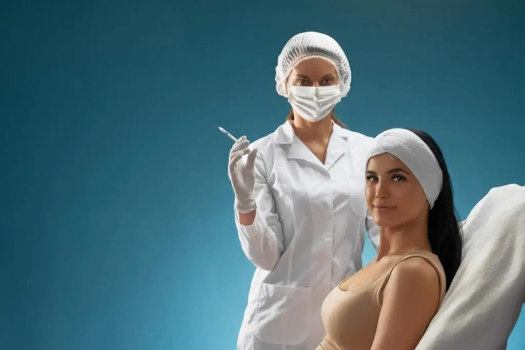 doctor with syringe will do plastic surgery on patient
