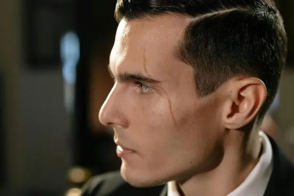 A man with scar on his face