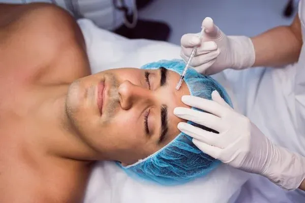 A male face lift in the process