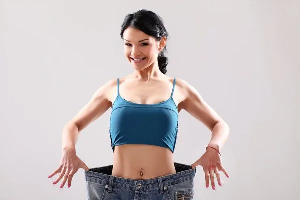 A woman shedding pounds after weight loss surgery
