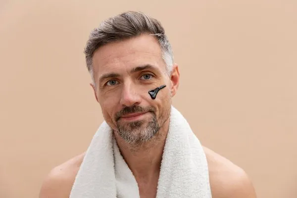 Man Showing Popular Male Facelift Techniques for a Natural, Masculine Look