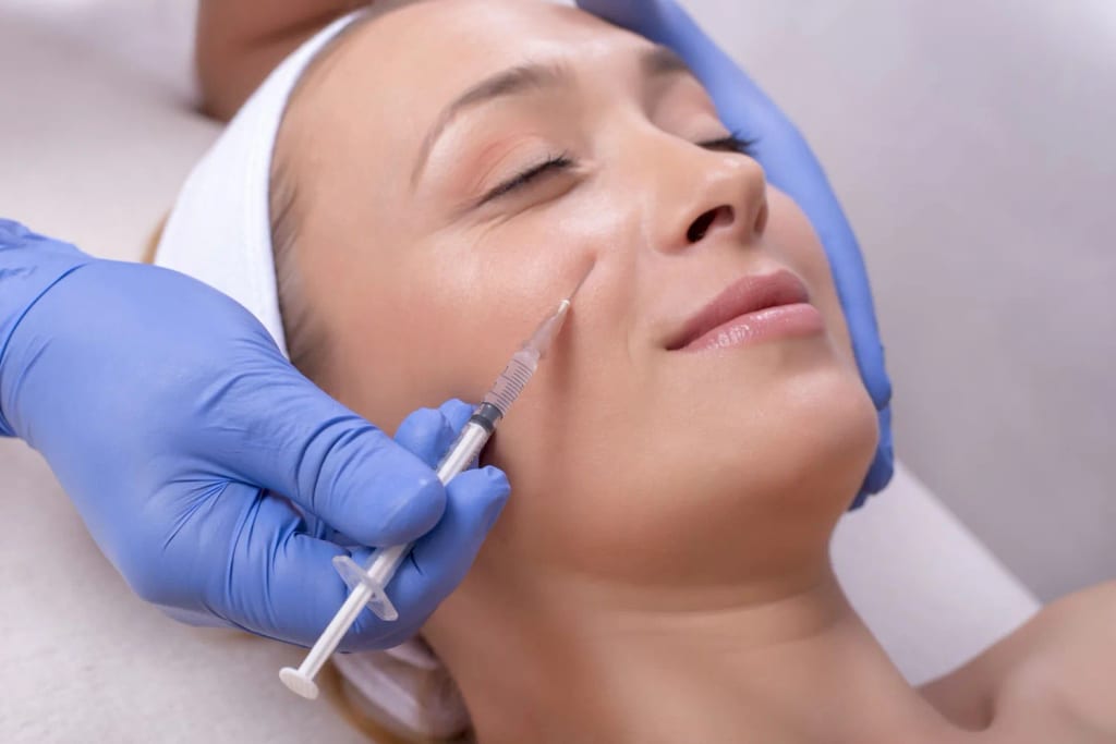 Woman being injected with Botox